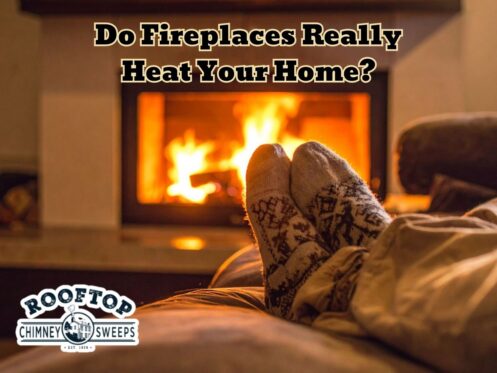cozy socks are visible of someone sitting in front of a fireplace being used as a supplemental heat source in their home in Richmond, VA
