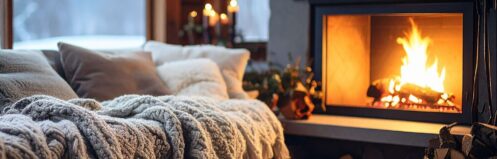 a cozy living space in front of a fireplace that is being used safely during extreme cold weather in Richmond, VA